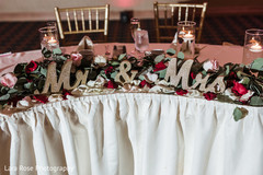 Indian bride and groom reception table decoration. Indian bride and groom reception table decoration.