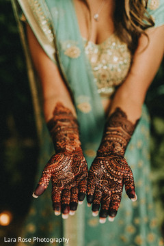 Indian bride showing her henna art. Indian bride showing her henna art.