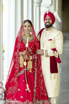 Indian bride holding Raja's sword. Indian bride holding Raja's sword.