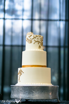 Ivory and golden indian wedding cake decorations. Ivory and golden indian wedding cake decorations.