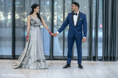 Maharani in her gray gown next to groom. Maharani in her gray gown next to groom.