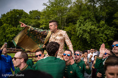 Groom having fun during Baraat procession Groom having fun during Baraat procession