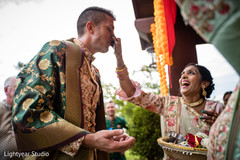 Groom meeting the bride's family during the baraat arrival Groom meeting the bride's family during the baraat arrival