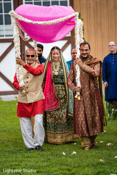 Indian bride's grand entrance to the wedding ceremony Indian bride's grand entrance to the wedding ceremony