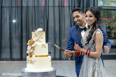 Indian couple cutting cake moment. Indian couple cutting cake moment.