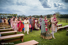 Indian newlyweds leaving wedding ceremony Indian newlyweds leaving wedding ceremony