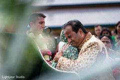 Indian bride saying goodbye to parents. Indian bride saying goodbye to parents.