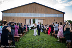 Sweet couple leaving Christian wedding ceremony Sweet couple leaving Christian wedding ceremony
