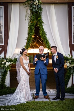 Bride and groom smiling at each other during the wedding ceremony Bride and groom smiling at each other during the wedding ceremony