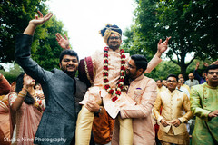 Indian groom lifted by groomsmen. Indian groom lifted by groomsmen.