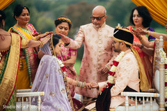 Indian bride and groom at joint of hands ritual. Indian bride and groom at joint of hands ritual.