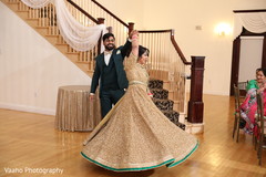 Indian bride and groom at reception dance. Indian bride and groom at reception dance.