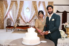 Indian couple cutting cake moment. Indian couple cutting cake moment.