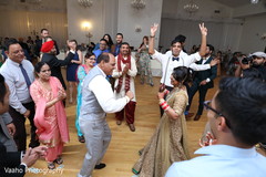 Indian bride dancing with parent. Indian bride dancing with parent.