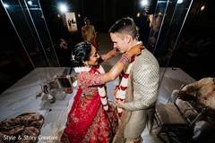 Indian bride and groom during the jaimala ritual. Indian bride and groom during the jaimala ritual.