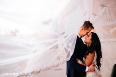Indian couple under veil capture. Indian couple under veil capture.