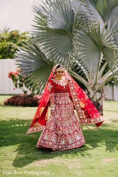 Maharani in her red and golden lehenga. Maharani in her red and golden lehenga.