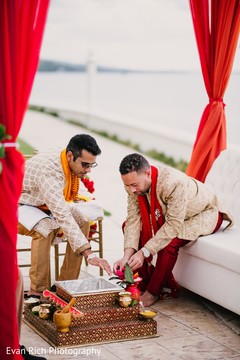 Raja putting flowers to Agni. Raja putting flowers to Agni.