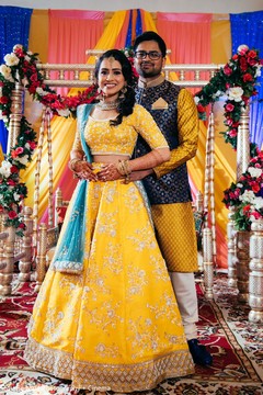 Indian bride and groom posing at Sangeet stage. Indian bride and groom posing at Sangeet stage.