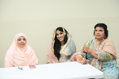 Indian bride getting ready to sign her marriage certificate Indian bride getting ready to sign her marriage certificate