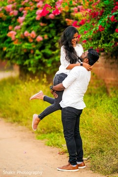 Indian lovebirds having fun at their outdoor photoshoot Indian lovebirds having fun at their outdoor photoshoot