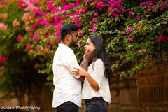 Sweet moment captured during romantic outdoor photoshoot Sweet moment captured during romantic outdoor photoshoot