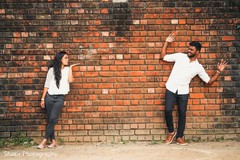 Indian bride and groom having fun at their outdoor photo session Indian bride and groom having fun at their outdoor photo session
