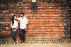 Romantic Indian bride and groom looking at each other. Romantic Indian bride and groom looking at each other.