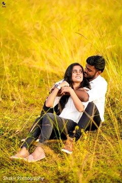 Sweet and charming moment of bride and groom surrounded by greenery Sweet and charming moment of bride and groom surrounded by greenery