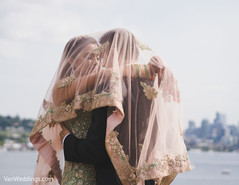 Lovely capture of Indian bride and groom looking at each other. Lovely capture of Indian bride and groom looking at each other.