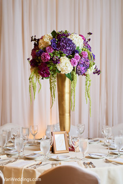 Graceful floral centerpiece and table linens Graceful floral centerpiece and table linens