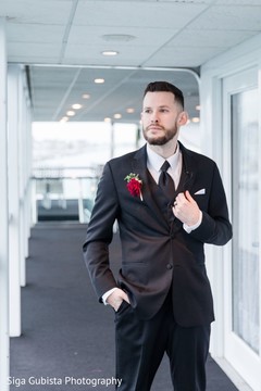 Elegant groom posing for photoshoot before the wedding ceremony Elegant groom posing for photoshoot before the wedding ceremony
