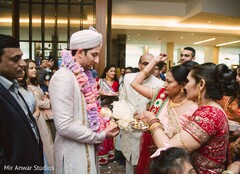 Indian groom welcoming to the ceremony ritual. Indian groom welcoming to the ceremony ritual.
