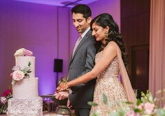Maharani and raja cutting the cake. Maharani and raja cutting the cake.