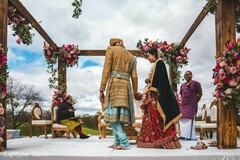 Indian couple walking around the sacred fire. Indian couple walking around the sacred fire.