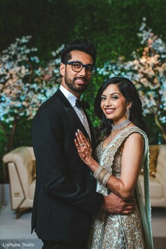 Maharani and raja posing at the wedding reception venue. Maharani and raja posing at the wedding reception venue.