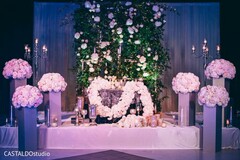 Indians couple wedding reception table decoration. Indians couple wedding reception table decoration.
