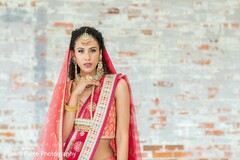 Indian bride on her Coral color sari. Indian bride on her Coral color sari.