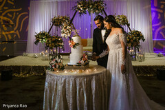Indian couple cutting cake photography. Indian couple cutting cake photography.