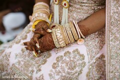 White and golden Maharani's wedding bangles. White and golden Maharani's wedding bangles.
