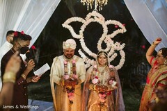 Indian couple at their wedding ceremony capture. Indian couple at their wedding ceremony capture.
