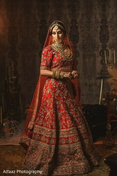Lovely Maharani in her red lengha with golden embroidery. Lovely Maharani in her red lengha with golden embroidery.