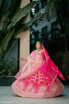 Pink and golden Indian bridal ceremony lehenga. Pink and golden Indian bridal ceremony lehenga.