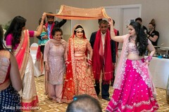 Indian bride's entrance to the wedding ceremony. Indian bride's entrance to the wedding ceremony.