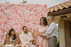 Indian bride and groom with relatives at engagement ritual. Indian bride and groom with relatives at engagement ritual.