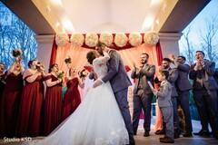 Indian groom kissing Indian bride photo. Indian groom kissing Indian bride photo.