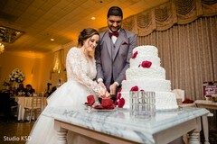 Indian couple cutting cake moment. Indian couple cutting cake moment.