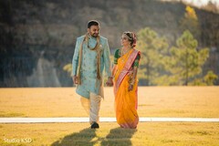 Indian couple walking hand in hand capture. Indian couple walking hand in hand capture.