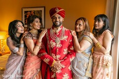 Indian groom posing with bridesmaids. Indian groom posing with bridesmaids.