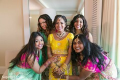 Indian bride with bridesmaids ready for the Haldi celebration. Indian bride with bridesmaids ready for the Haldi celebration.